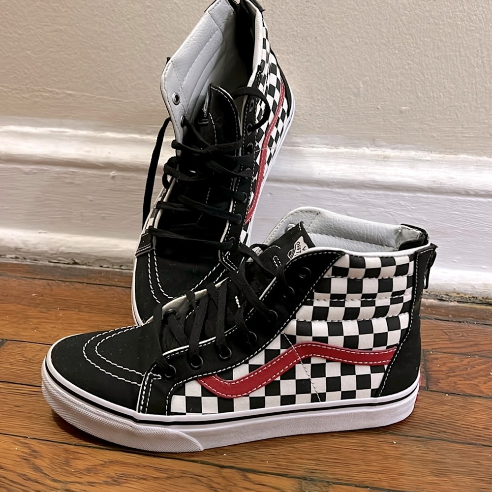 Van sk8-hi size kids 6 black and white checkered with red stripe.